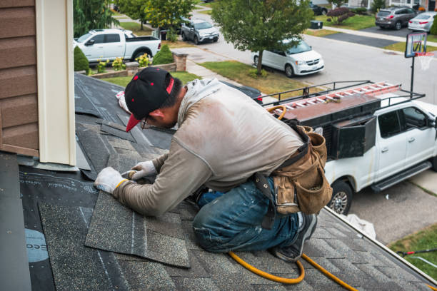 Professional Gutter Repair And Installation technician working in Perryopolis, PA